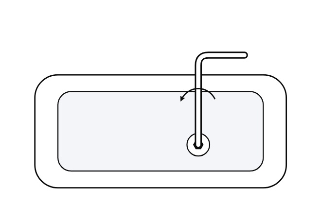 A hex key undoing the screw on the bottom cover